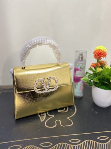 Ladies hand bag Gold